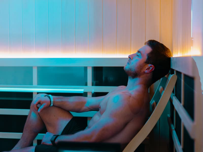Unwinding in a private infrared sauna suite